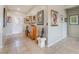 Inviting foyer with neutral tile flooring and decorative artwork at 2633 Flare Star Dr, Henderson, NV 89044