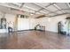 Spacious garage with storage cabinets, epoxy floors, and ample room for vehicles at 2633 Flare Star Dr, Henderson, NV 89044