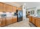 Kitchen featuring stainless steel appliances and light wood cabinetry at 2633 Flare Star Dr, Henderson, NV 89044