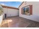 A clean side yard featuring desert landscaping and privacy wall at 2633 Flare Star Dr, Henderson, NV 89044