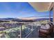 Relax on this condo balcony with panoramic views of the city and mountains at 2700 Las Vegas Blvd # 4002, Las Vegas, NV 89109