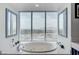 Bathroom soaking tub offers expansive city views from its floor-to-ceiling windows at 2700 Las Vegas Blvd # 4002, Las Vegas, NV 89109