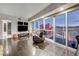 Comfortable living room with city views through expansive windows and a sleek entertainment setup at 2700 Las Vegas Blvd # 4002, Las Vegas, NV 89109