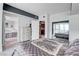 Well-lit main bedroom has a chest of drawers, ensuite, and a large window reflected in closet at 2700 Las Vegas Blvd # 4002, Las Vegas, NV 89109