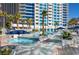 Relaxing pool area surrounded by palm trees and modern lounge furniture at 2700 Las Vegas Blvd # 4002, Las Vegas, NV 89109