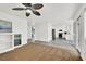 Open living space with carpeted area and views into the kitchen at 271 Francisco St, Henderson, NV 89014