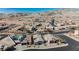 Wide aerial shot of the community showcasing mountain views, desert landscape, and well-maintained streets at 2721 Benton Cove St, Laughlin, NV 89029