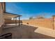 Spacious backyard featuring gravel, a covered patio, and a block wall for privacy at 2721 Benton Cove St, Laughlin, NV 89029