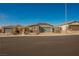 Charming single-story home with a two-car garage and desert landscaping at 2721 Benton Cove St, Laughlin, NV 89029