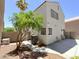 Side view of a home with a well-maintained backyard and patio area at 326 Lander Dr, Henderson, NV 89074