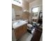 Bright bathroom featuring a large mirror and modern vanity at 326 Lander Dr, Henderson, NV 89074