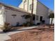 Stylish exterior showcasing a well-maintained yard and charming entryway at 326 Lander Dr, Henderson, NV 89074