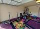 Garage space featuring fitness equipment and a colorful floral rug at 326 Lander Dr, Henderson, NV 89074