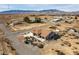 Aerial view showcasing the property's location in a desert community with mountain backdrop at 3430 Flagstone Ct # 2, Pahrump, NV 89048