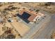 Overhead view of a single Gathering home, backyard and desert landscaping at 3430 Flagstone Ct # 2, Pahrump, NV 89048