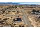 Wide aerial view of the home's location in a sprawling desert community with mountain views at 3430 Flagstone Ct # 2, Pahrump, NV 89048