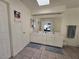 Bright bathroom featuring double sinks, a large mirror, and white cabinetry at 3550 Leor Ct, Las Vegas, NV 89121