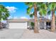 Charming single-story home with a well-maintained front yard, and a two-car garage at 3936 Savoy Ct, Las Vegas, NV 89115