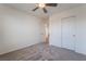 Neutral bedroom featuring carpet and a closet at 406 Misterioso St, Henderson, NV 89011