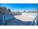 Large backyard with a concrete slab and block walls providing privacy and potential for customization at 4746 Rosalie Cir, North Las Vegas, NV 89031