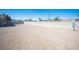 Large, sunny backyard with secure chain link and block wall fencing at 4746 Rosalie Cir, North Las Vegas, NV 89031