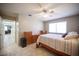 Spacious bedroom featuring tile flooring and ample natural light from the windows at 4746 Rosalie Cir, North Las Vegas, NV 89031