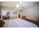 Bedroom view with a ceiling fan, closet, and ensuite bathroom at 4746 Rosalie Cir, North Las Vegas, NV 89031