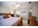 Bedroom view with a ceiling fan, closet, and ensuite bathroom at 4746 Rosalie Cir, North Las Vegas, NV 89031