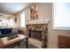 Cozy living room fireplace made with natural stone and tile flooring at 4746 Rosalie Cir, North Las Vegas, NV 89031