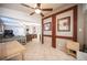 Open-concept living room and dining area features neutral colors and a view to the kitchen at 4746 Rosalie Cir, North Las Vegas, NV 89031