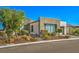 Modern home exterior with desert landscaping and contemporary design at 4775 E Beacon Ridge Dr, Pahrump, NV 89061