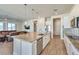 This kitchen boasts an island, stainless appliances, granite countertops, and an open layout at 4775 E Beacon Ridge Dr, Pahrump, NV 89061