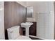 Bathroom with pedestal sink and tiled walls at 4775 Monaco Rd, Las Vegas, NV 89121