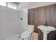 Bathroom with subway tile shower and pedestal sink at 4775 Monaco Rd, Las Vegas, NV 89121