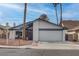 Charming single-story home featuring desert landscaping, an attached garage and a serene street view at 4775 Monaco Rd, Las Vegas, NV 89121