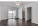 Open living room featuring dark floors and ceiling fan at 4775 Monaco Rd, Las Vegas, NV 89121