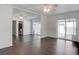 Open living room featuring dark floors and ceiling fan at 4775 Monaco Rd, Las Vegas, NV 89121