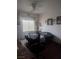 Bedroom features a black metal bedframe and a ceiling fan at 4970 Copperlyn St, Las Vegas, NV 89122