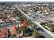 Overhead view of property showcasing the pool, mature trees and surrounding neighborhood at 5102 Tennis Ct, Las Vegas, NV 89120