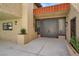 Grand entrance with double doors, planter box, and unique architecture at 5102 Tennis Ct, Las Vegas, NV 89120