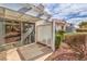 Private patio featuring a pergola cover and decorative rock landscaping creates a tranquil outdoor living space at 5185 Briar Meadow Way, Las Vegas, NV 89118