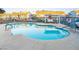 Community pool with blue water and surrounding lounge area in a well-maintained neighborhood setting at 5330 Rod Ct # 202, Las Vegas, NV 89122