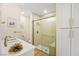 Bathroom featuring a stand-up shower with gold trim and a white vanity at 5520 Cranwood Ct, Las Vegas, NV 89130