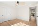 Bedroom with a ceiling fan and closet with sliding doors at 5520 Cranwood Ct, Las Vegas, NV 89130