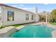 Outdoor pool and patio area with pergola, perfect for relaxing and entertaining in a serene setting at 5520 Cranwood Ct, Las Vegas, NV 89130