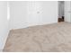 Bedroom with light carpet and white walls at 5616 Dunshee Vista Ave, Las Vegas, NV 89131