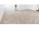 Large carpeted room with neutral tones and a glimpse of the closet at 5616 Dunshee Vista Ave, Las Vegas, NV 89131