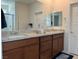 Bathroom features double sinks, granite countertops, and tiled floors at 5980 E Drosetta Ave, Pahrump, NV 89061