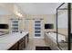 Modern bathroom featuring a soaking tub, dual vanity, and stylish sliding doors at 6021 Vista Clara St, Las Vegas, NV 89148