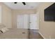 Comfortable bedroom with neutral walls, wood-look flooring, ceiling fan, large closet, and modern ceiling fan at 6021 Vista Clara St, Las Vegas, NV 89148